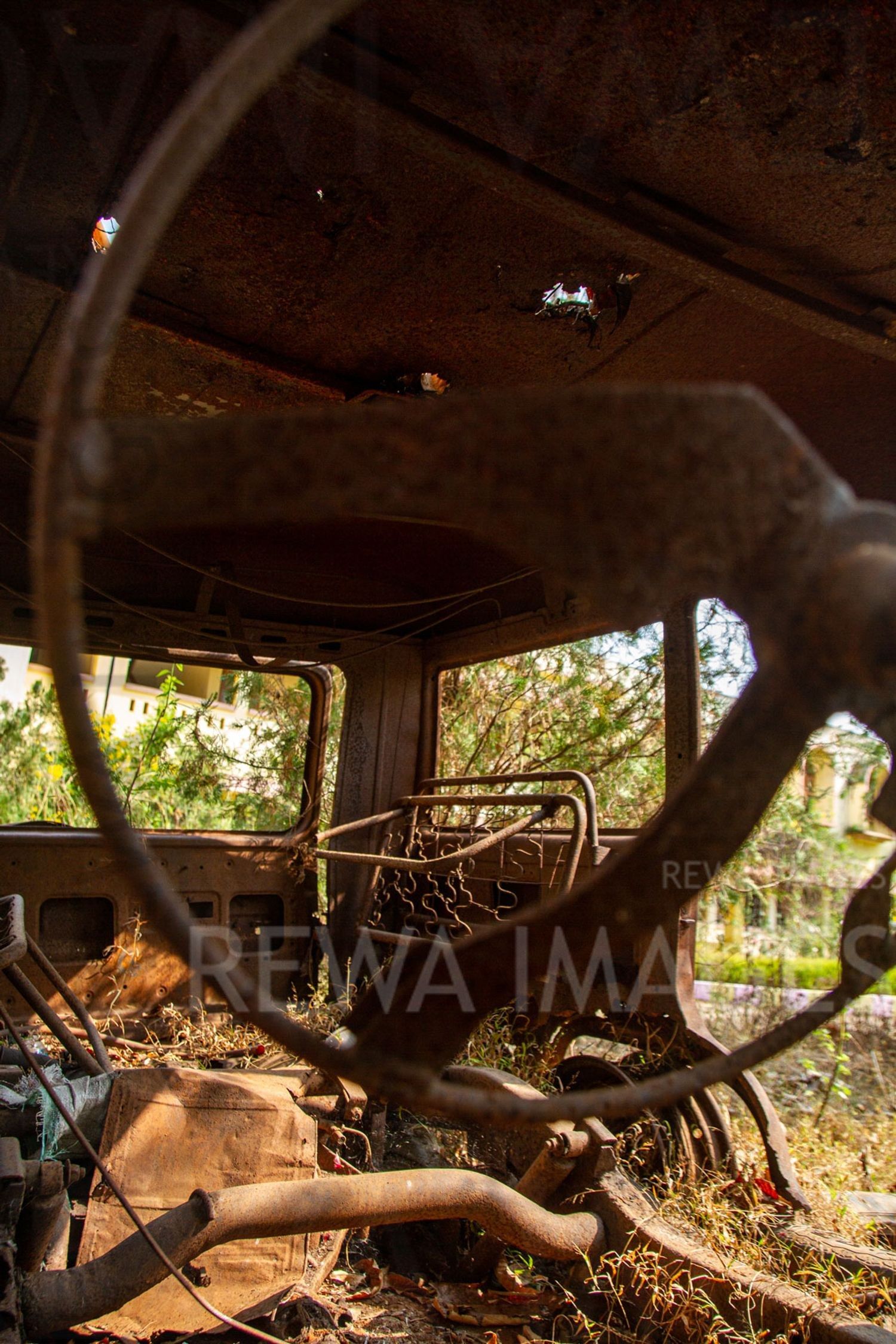 The burnt vehicle at the Pastoral House