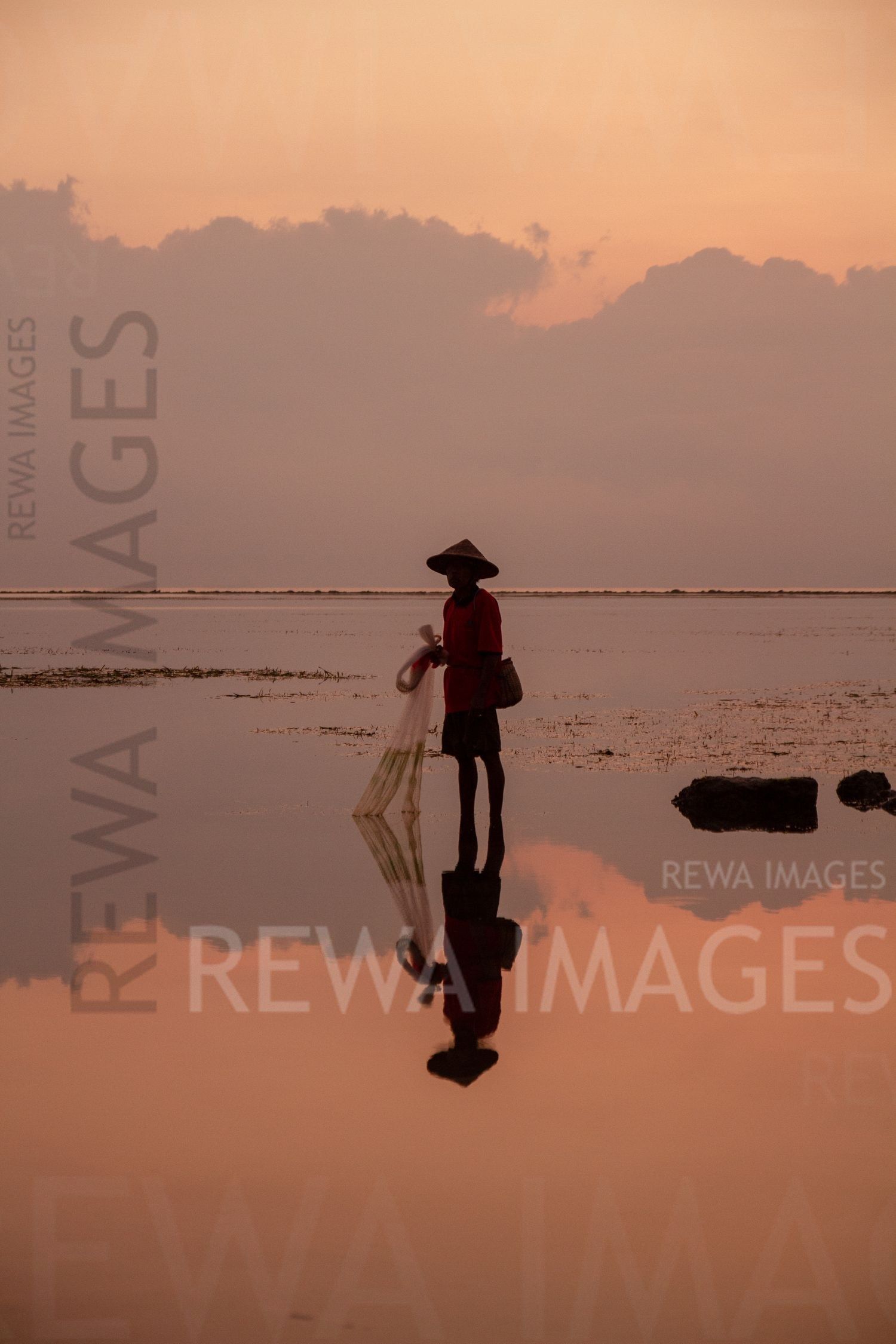 Fisherman at the sunrise