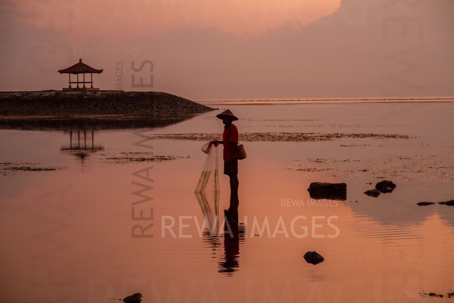 Fisherman at the sunrise
