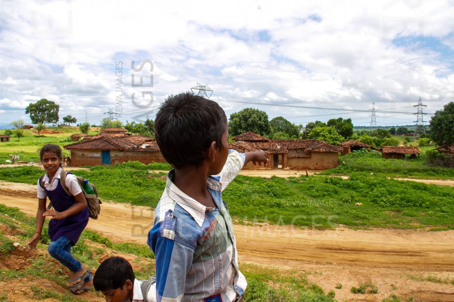 Children pointing to their land going for Sasan Coal project in Singrauli