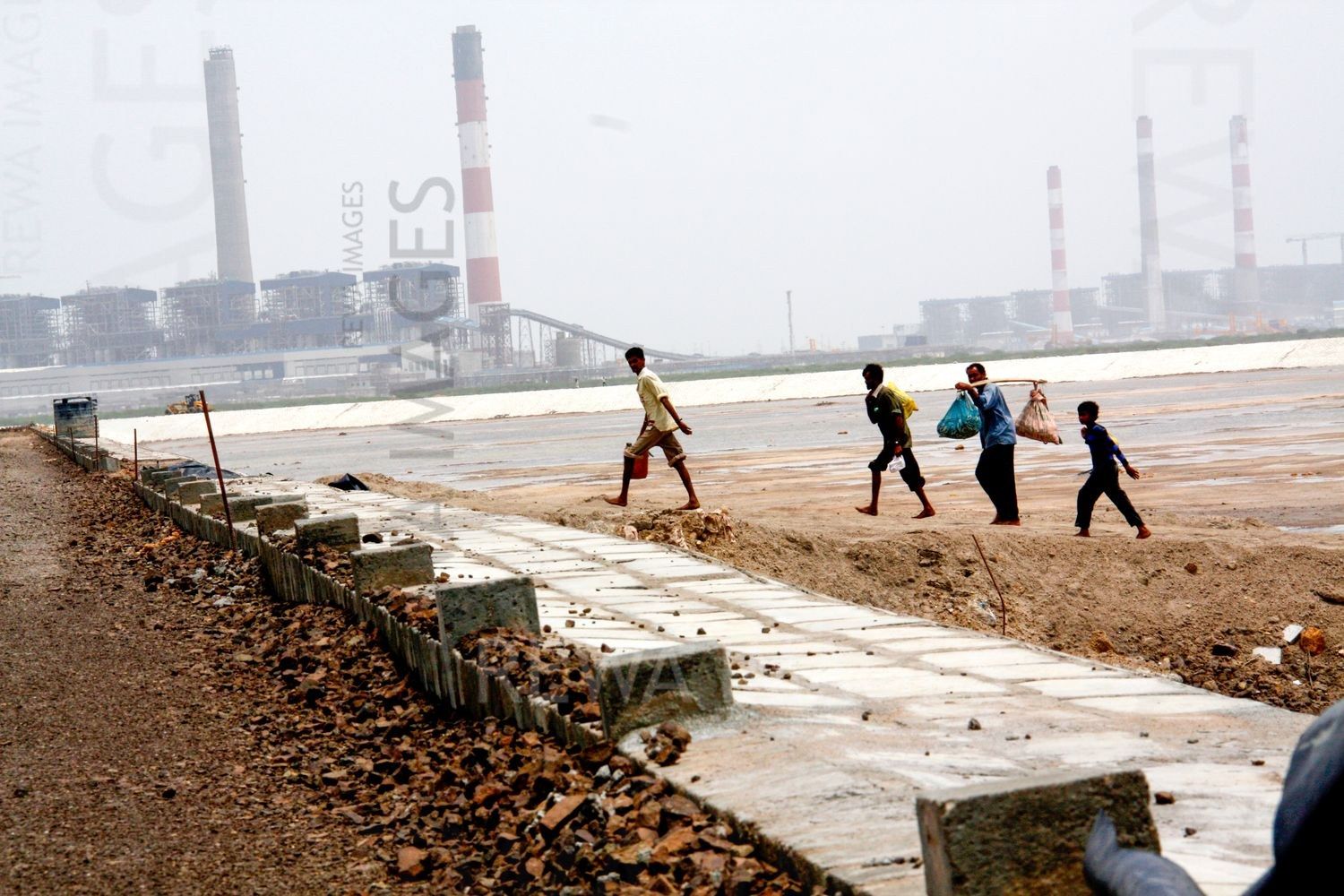 Fishworkers at Tata Mundra project