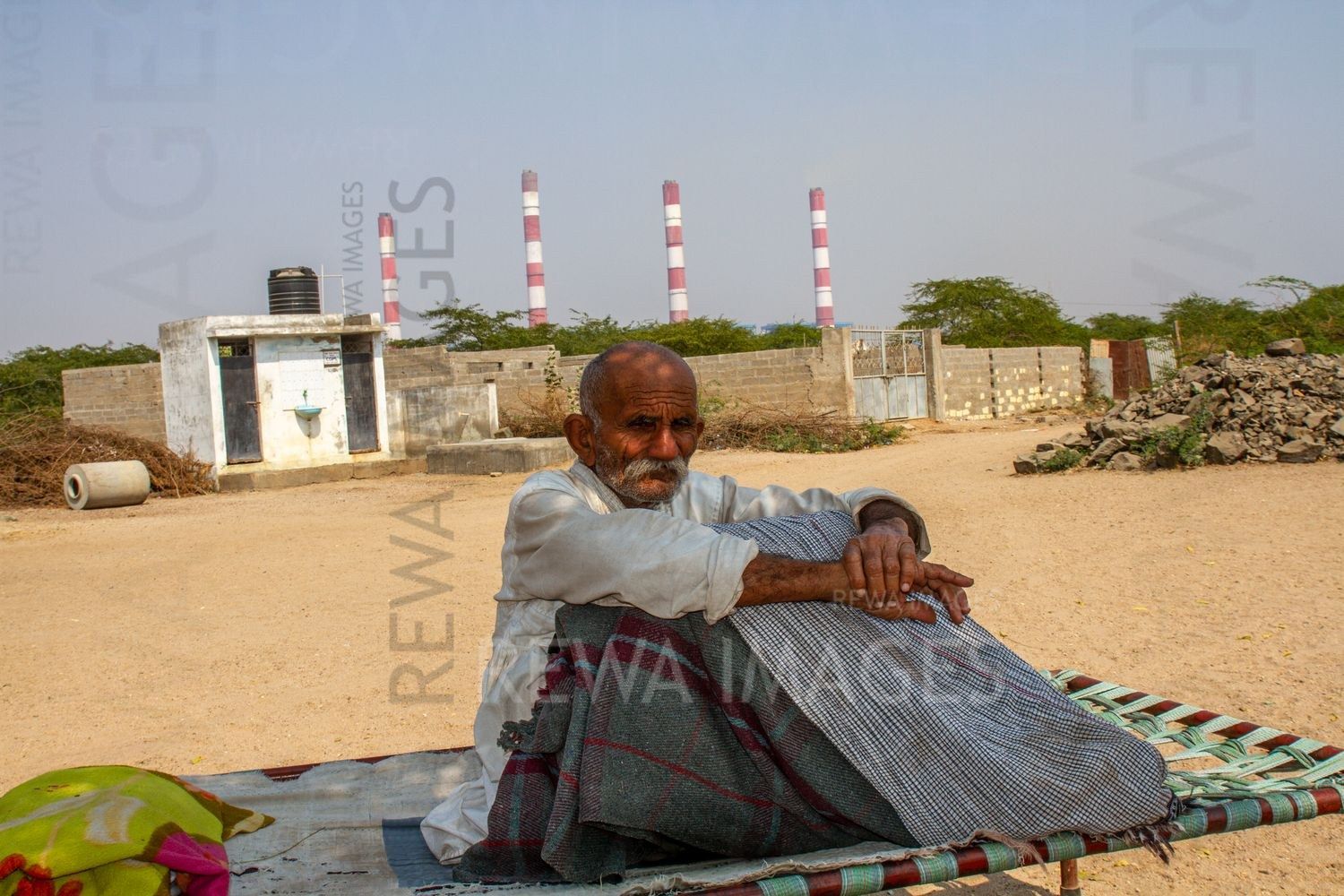 Old man under the shadow of Adani project in Mundra
