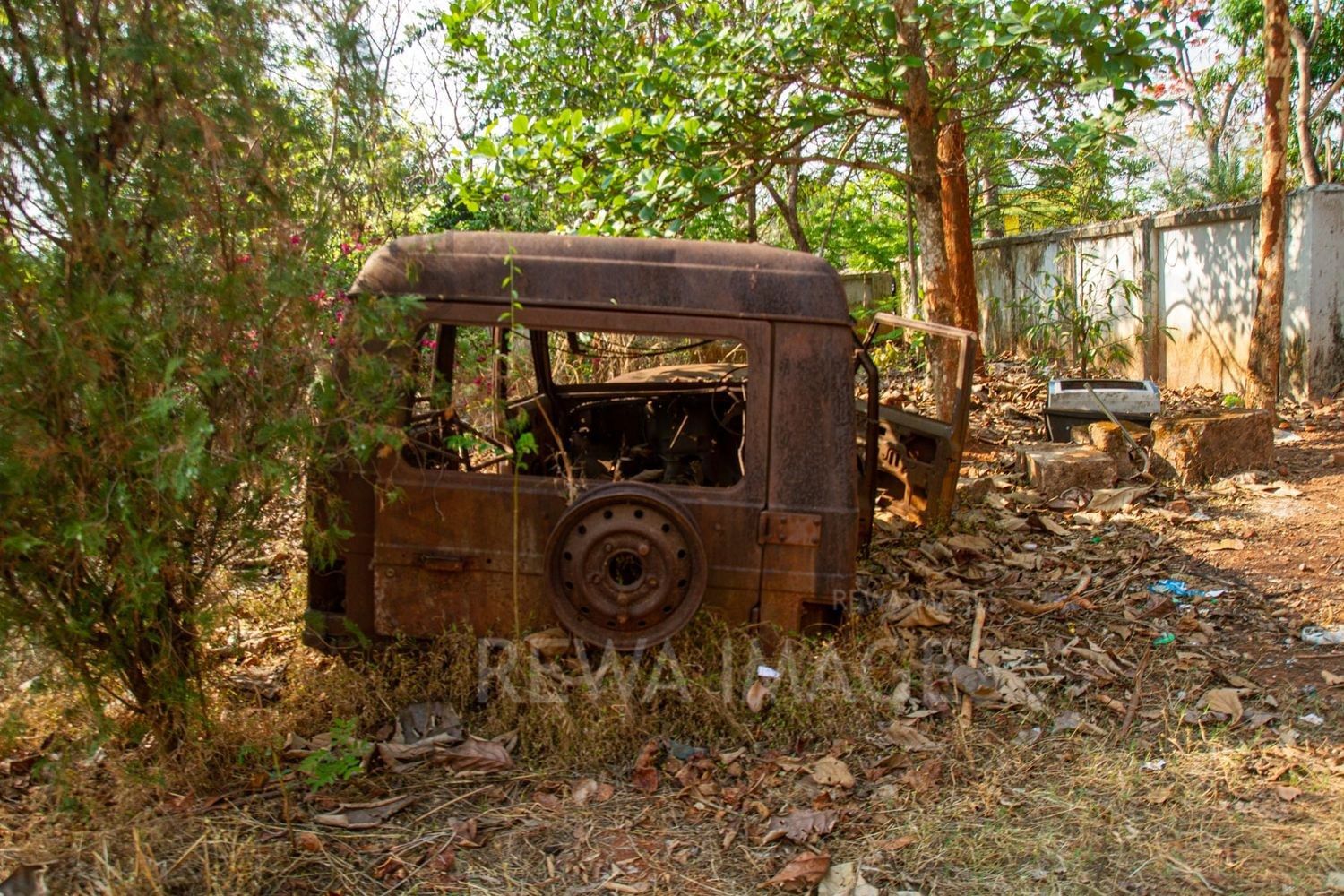 The burnt vehicle at the Pastoral House
